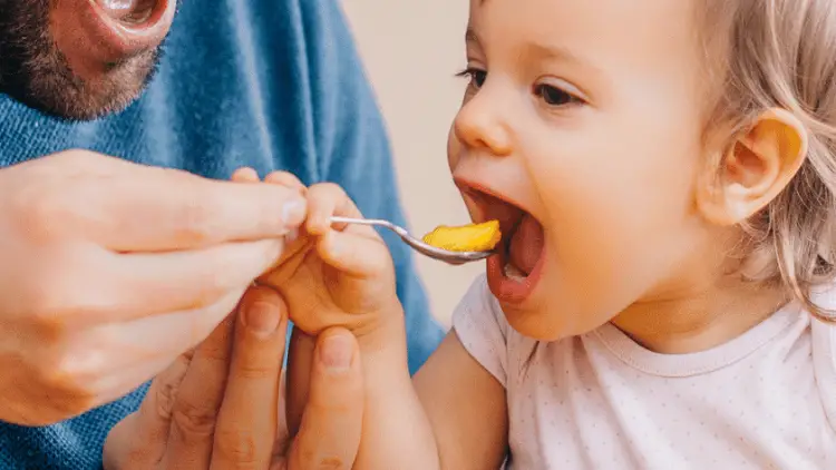 when to introduce solid food to baby
